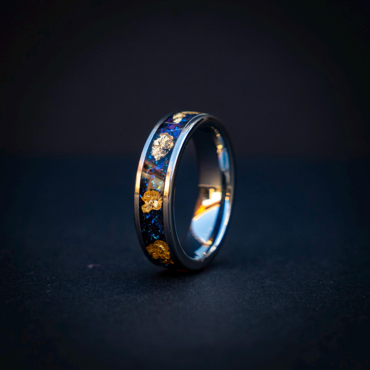Elegant 6mm Tungsten Carbide Ring with Blue Raw Sapphire & Gold Leaf Accents. | Decazi