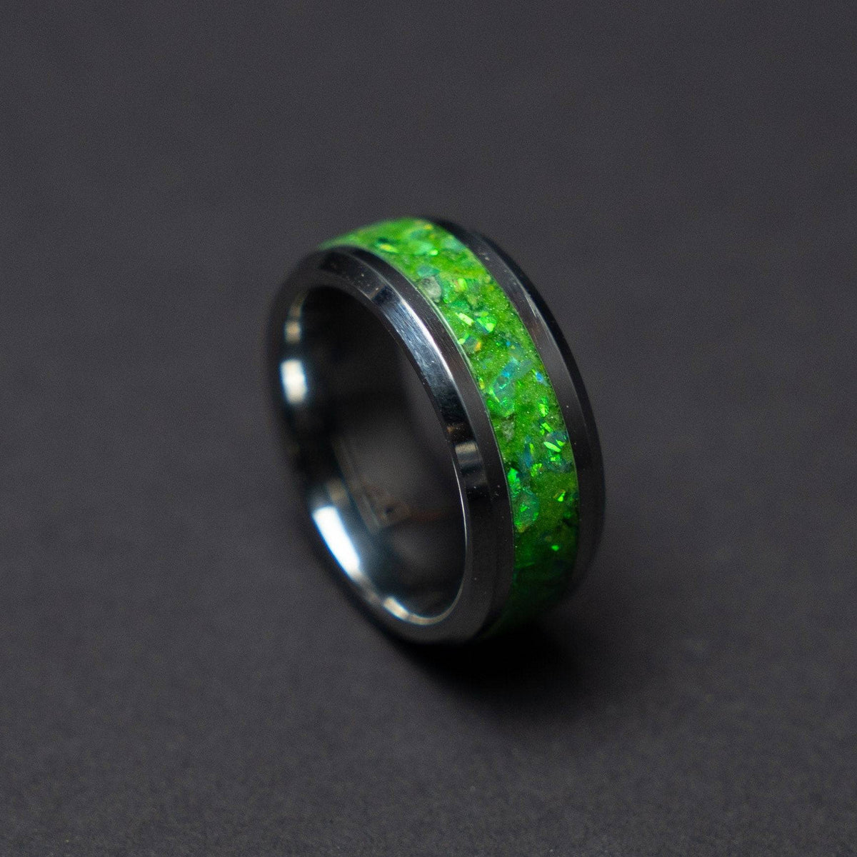 Glow in the dark tungsten ring filled with green opal