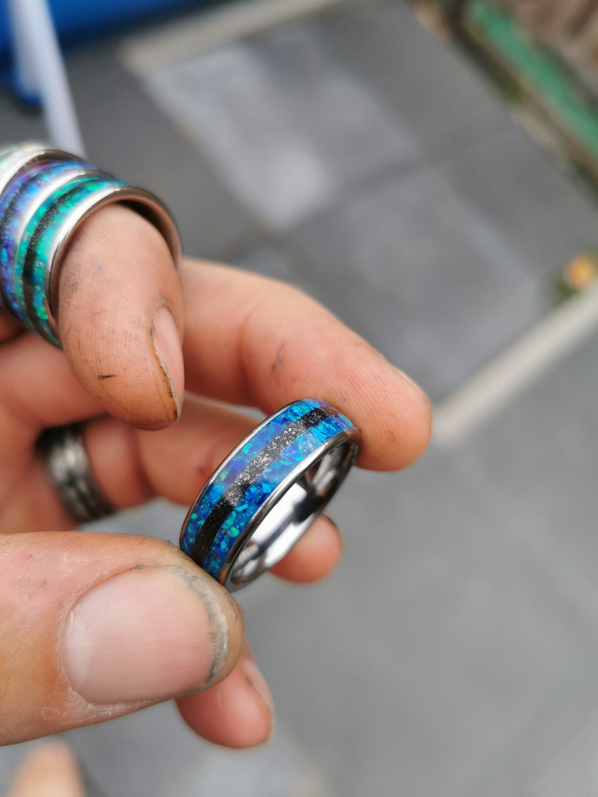 Blue opal ring with meteorite inlay.
