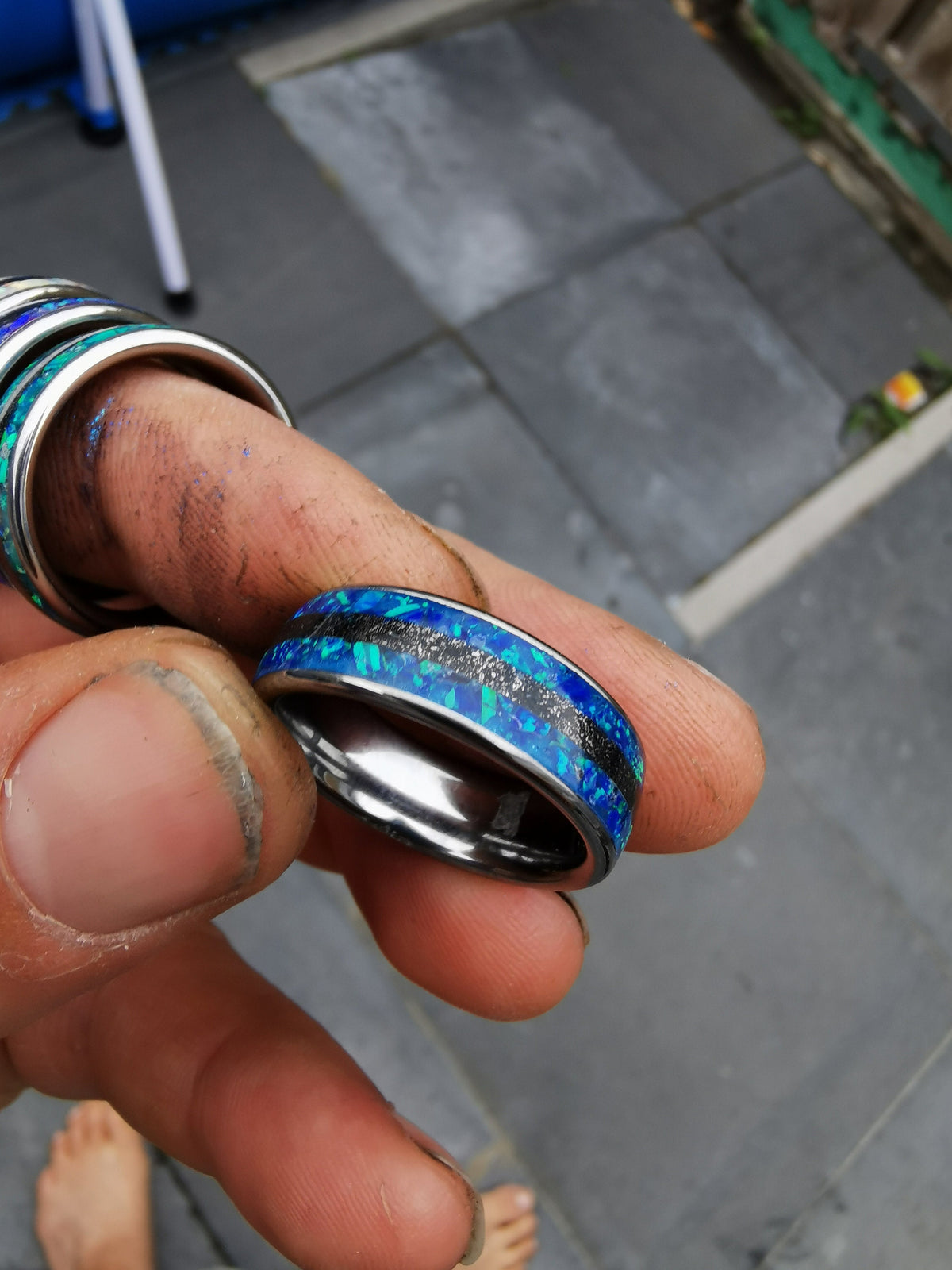 Blue opal ring with meteorite inlay.