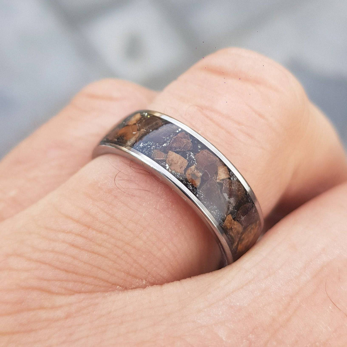 Silver tungsten ring with Trex fossil