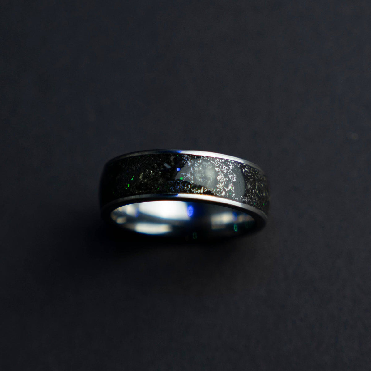 Tungsten ring filled with genuine Moldavite