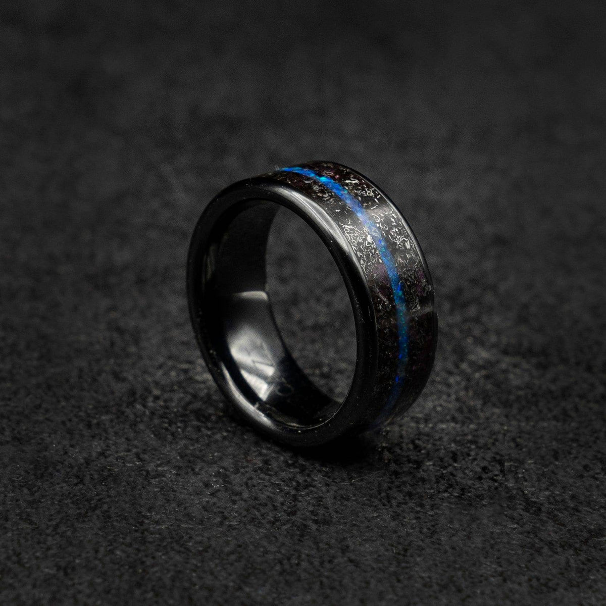 Tungsten ring filled with meteorite and offset blue opal line