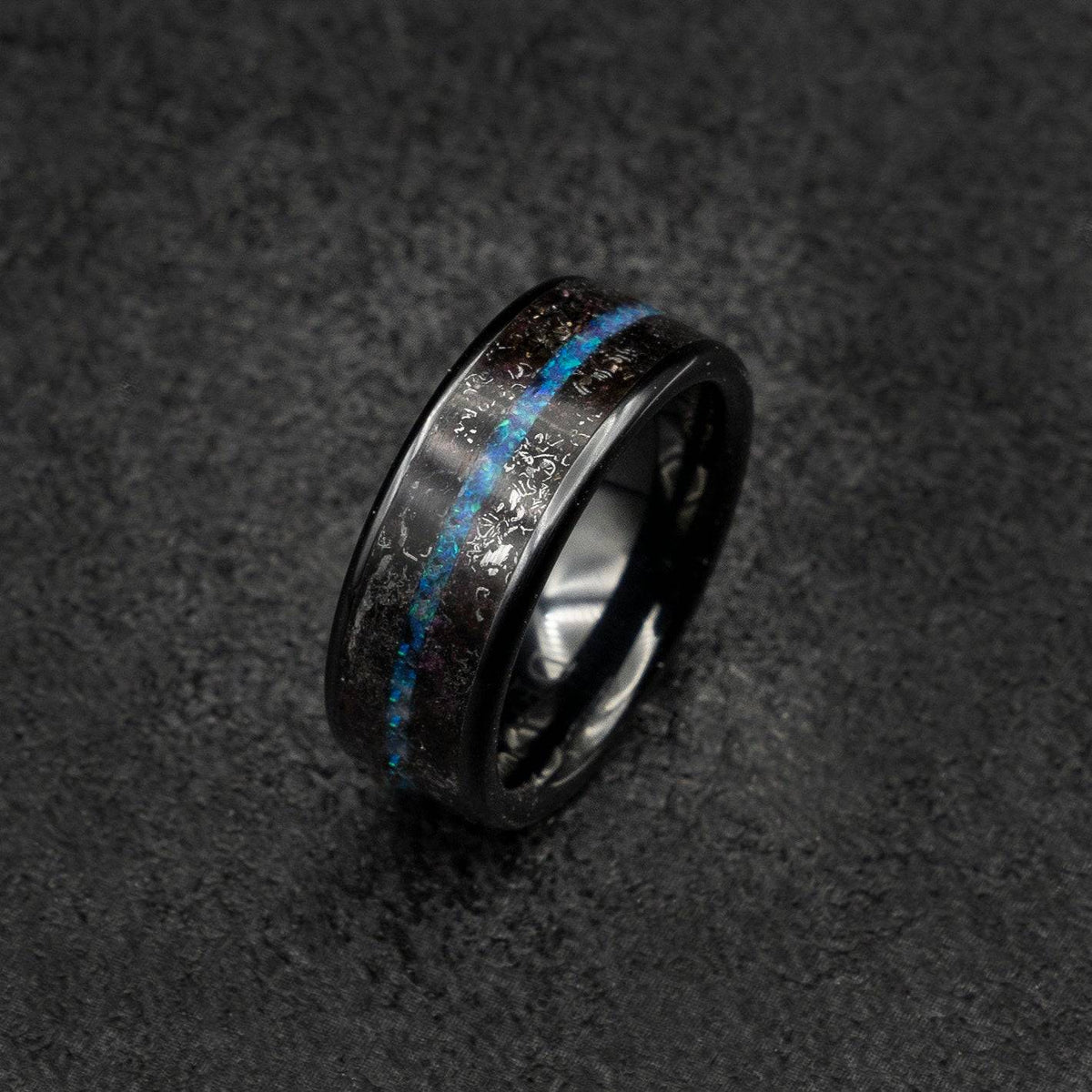 Tungsten ring filled with meteorite and offset blue opal line