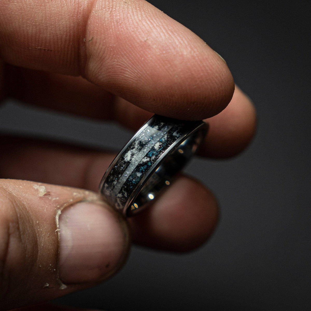 Tungsten ring with a line of Herkimer diamond, meteorite and glow