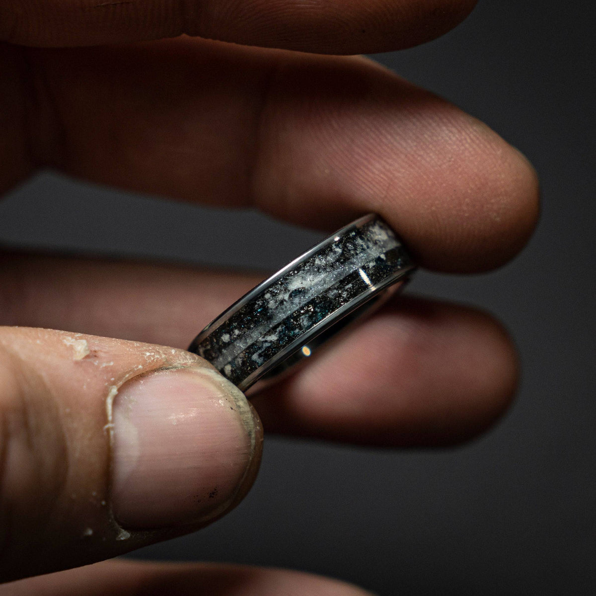 Tungsten ring with a line of Herkimer diamond, meteorite and glow