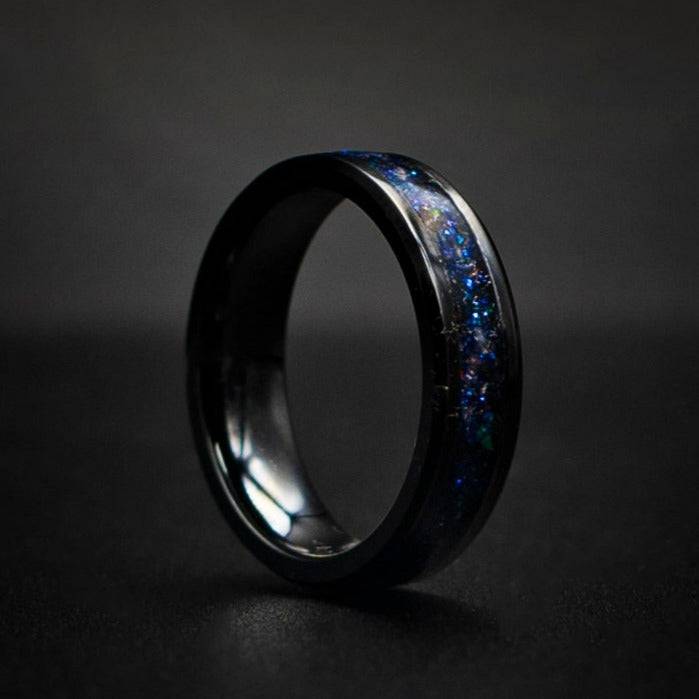 Black ceramic ring filled with galactic chameleon flakes