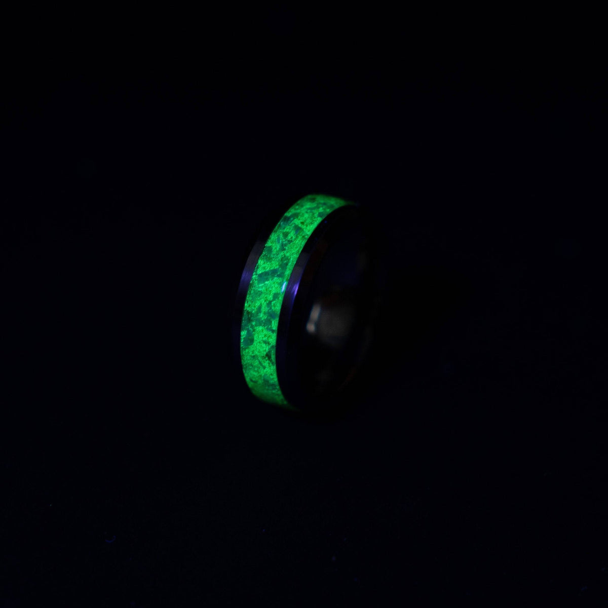 Glow in the dark tungsten ring filled with green opal