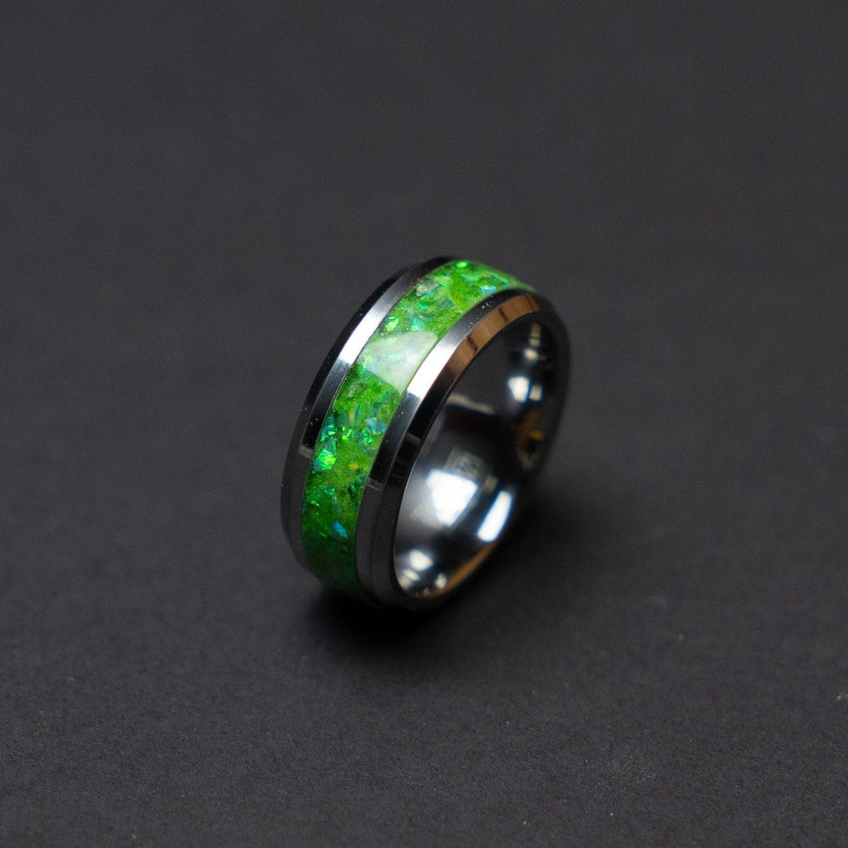 Glow in the dark tungsten ring filled with green opal