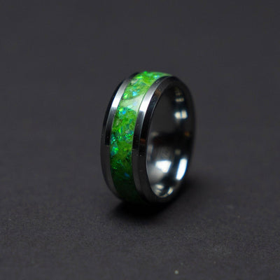 Glow in the dark tungsten ring filled with green opal