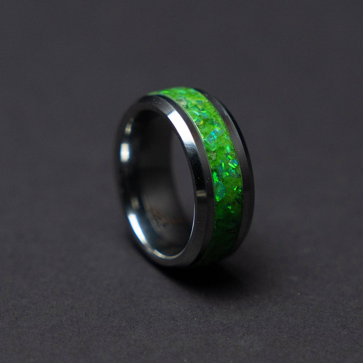 Glow in the dark tungsten ring filled with green opal
