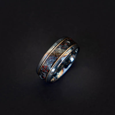 Tungsten ring filled with meteorite dust, red opal and 18k gold