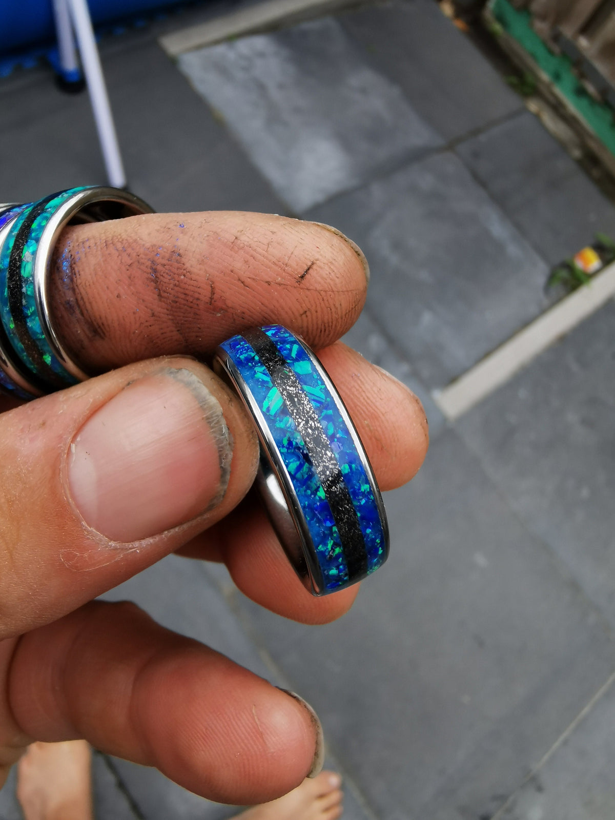 Blue opal ring with meteorite inlay.