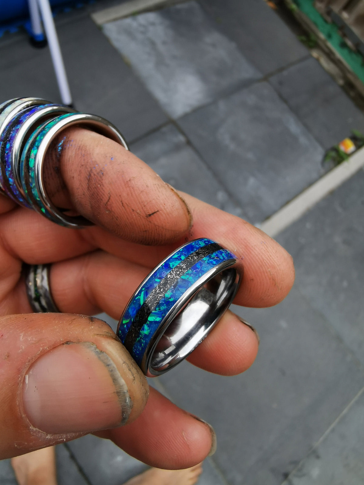 Blue opal ring with meteorite inlay.