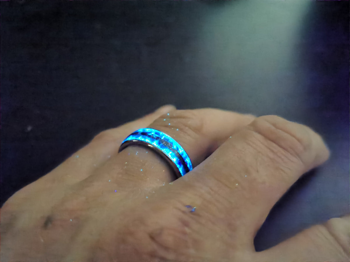 Blue opal ring with meteorite inlay.
