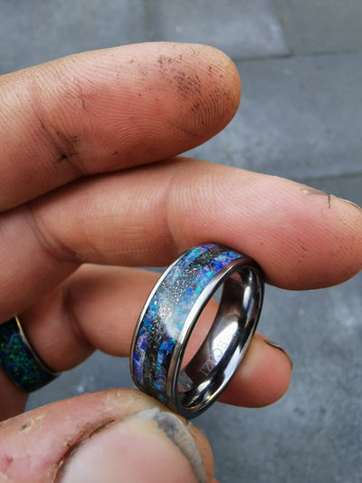 Mens meteorite ring with galaxy opal inlay.