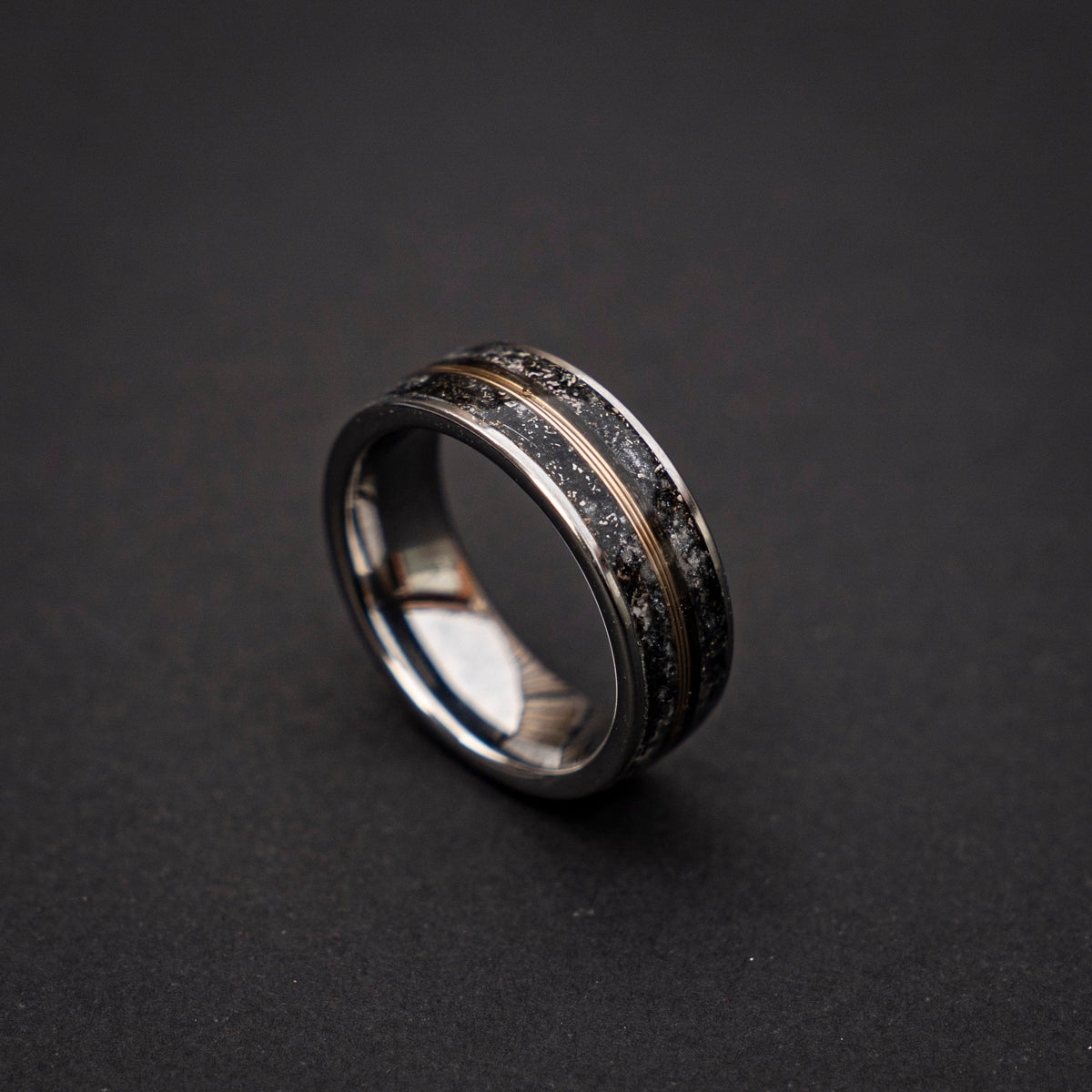 Meteorite Dust ring with glow in the dark and Goldwire.