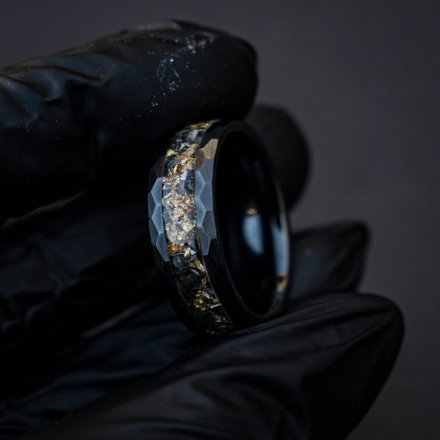 Black ceramic hammered ring filled with Meteorite and Goldleaf