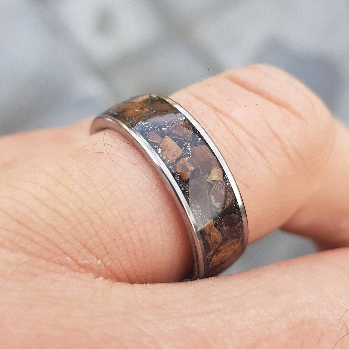 Silver tungsten ring with Trex fossil