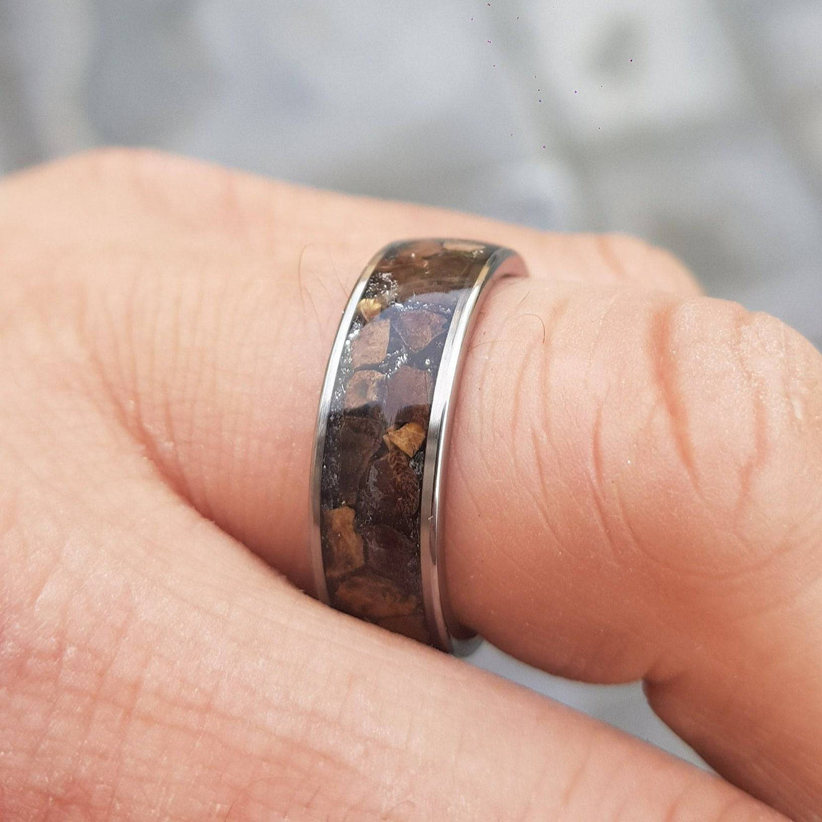 Silver tungsten ring with Trex fossil