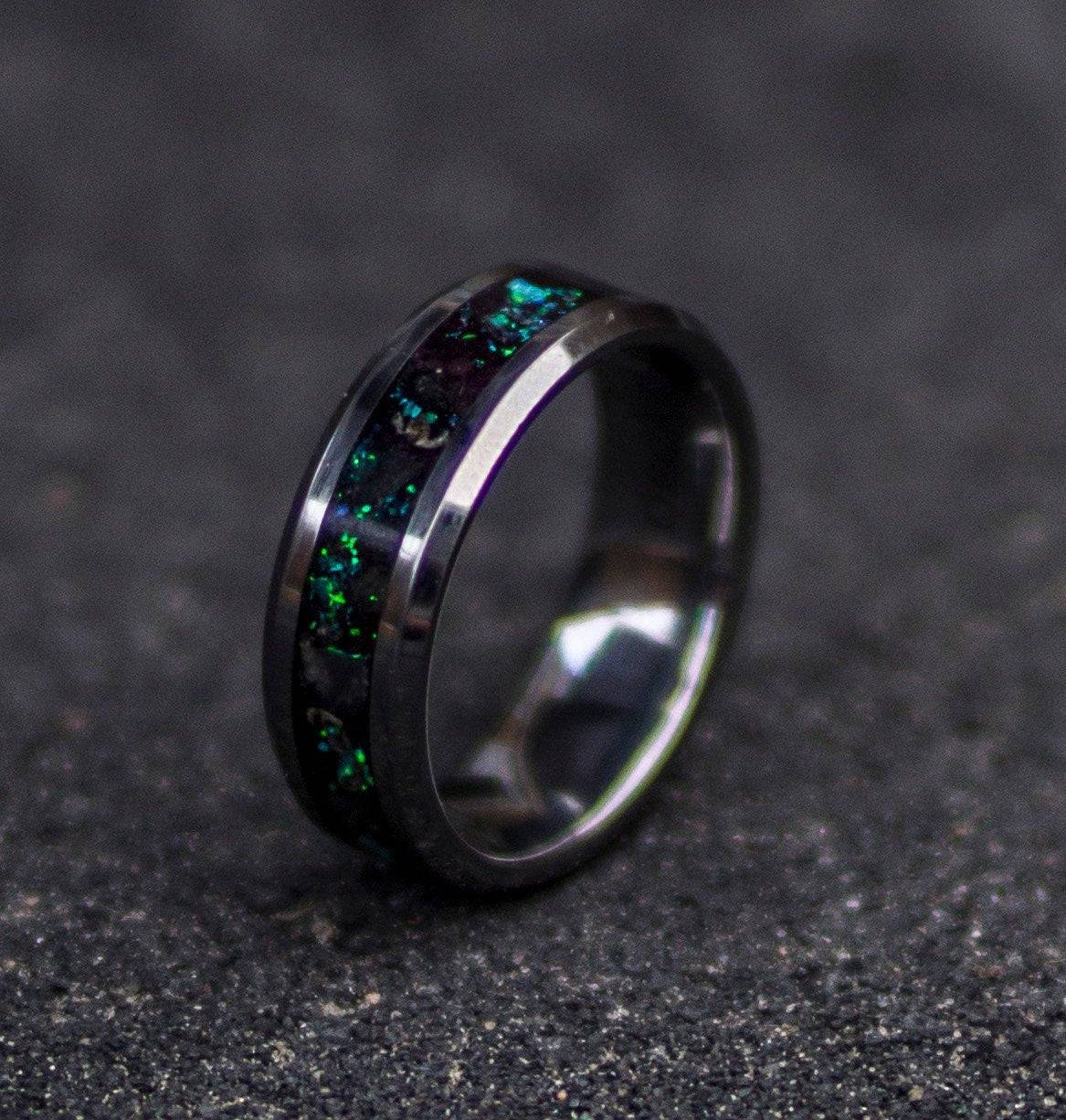 Tungsten ring filled with galaxy opal and glow stones