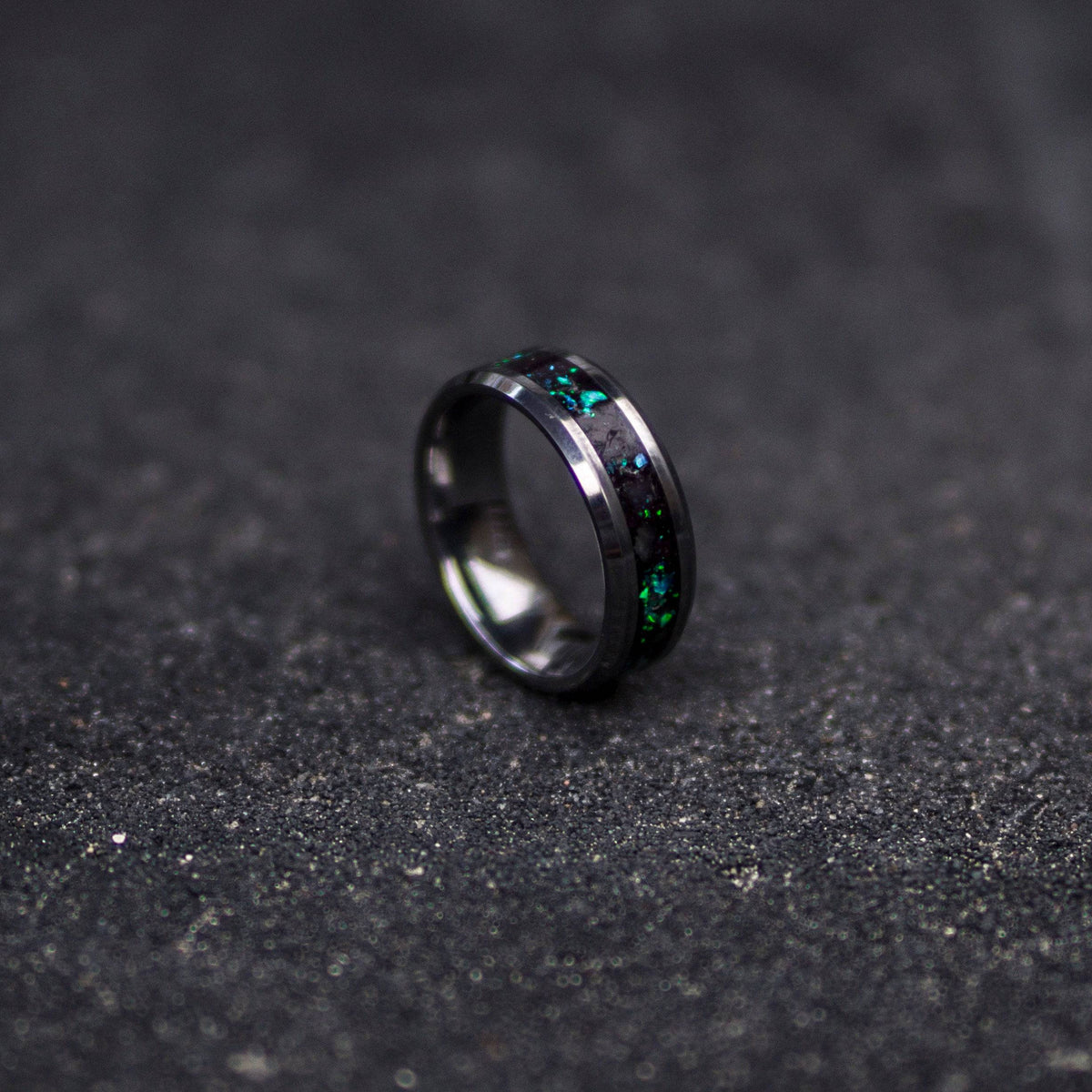 Tungsten ring filled with galaxy opal and glow stones