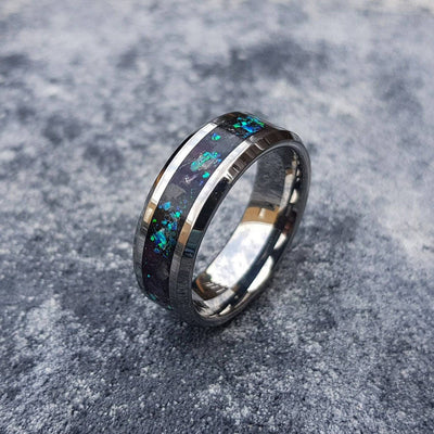 Tungsten ring filled with galaxy opal and glow stones