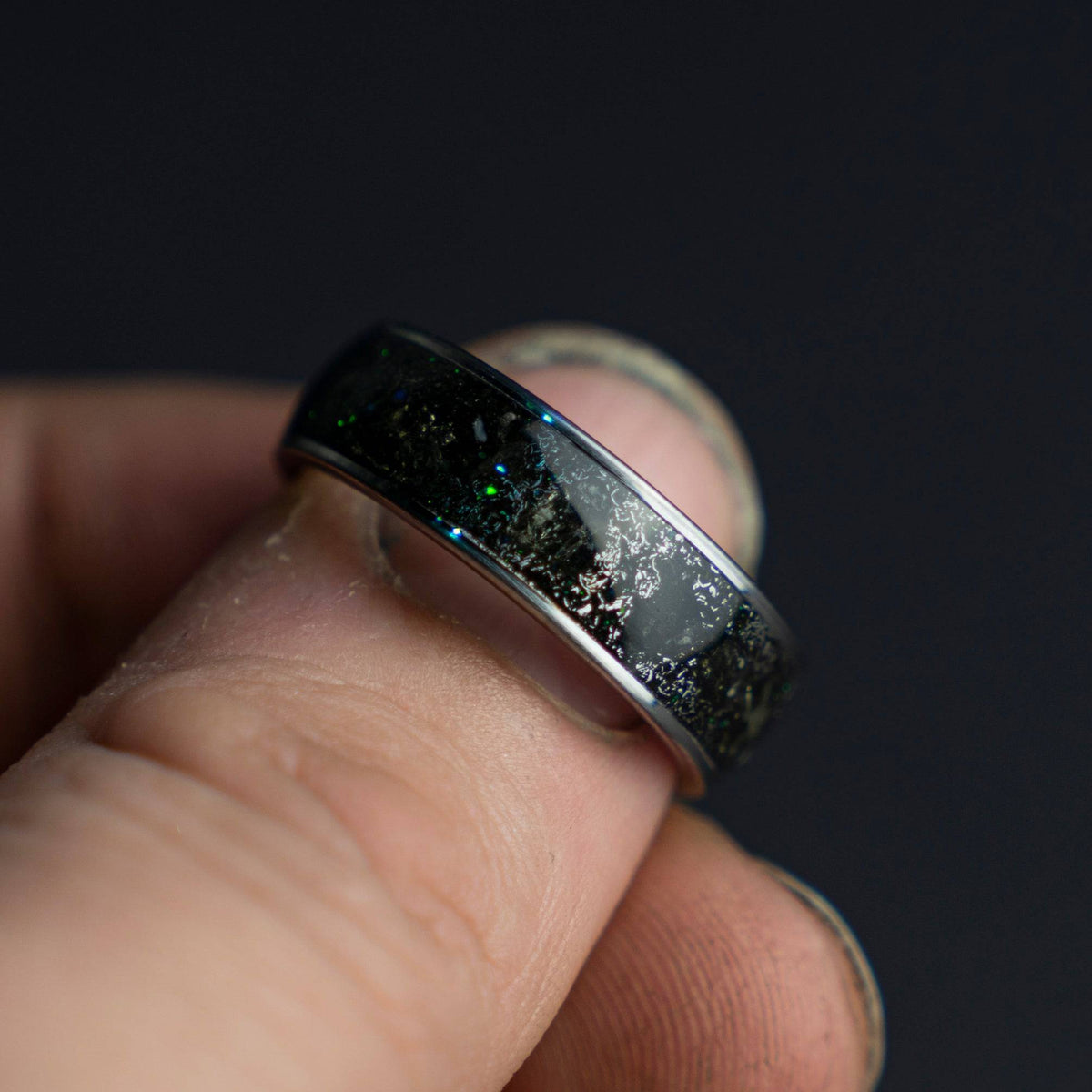 Tungsten ring filled with genuine Moldavite