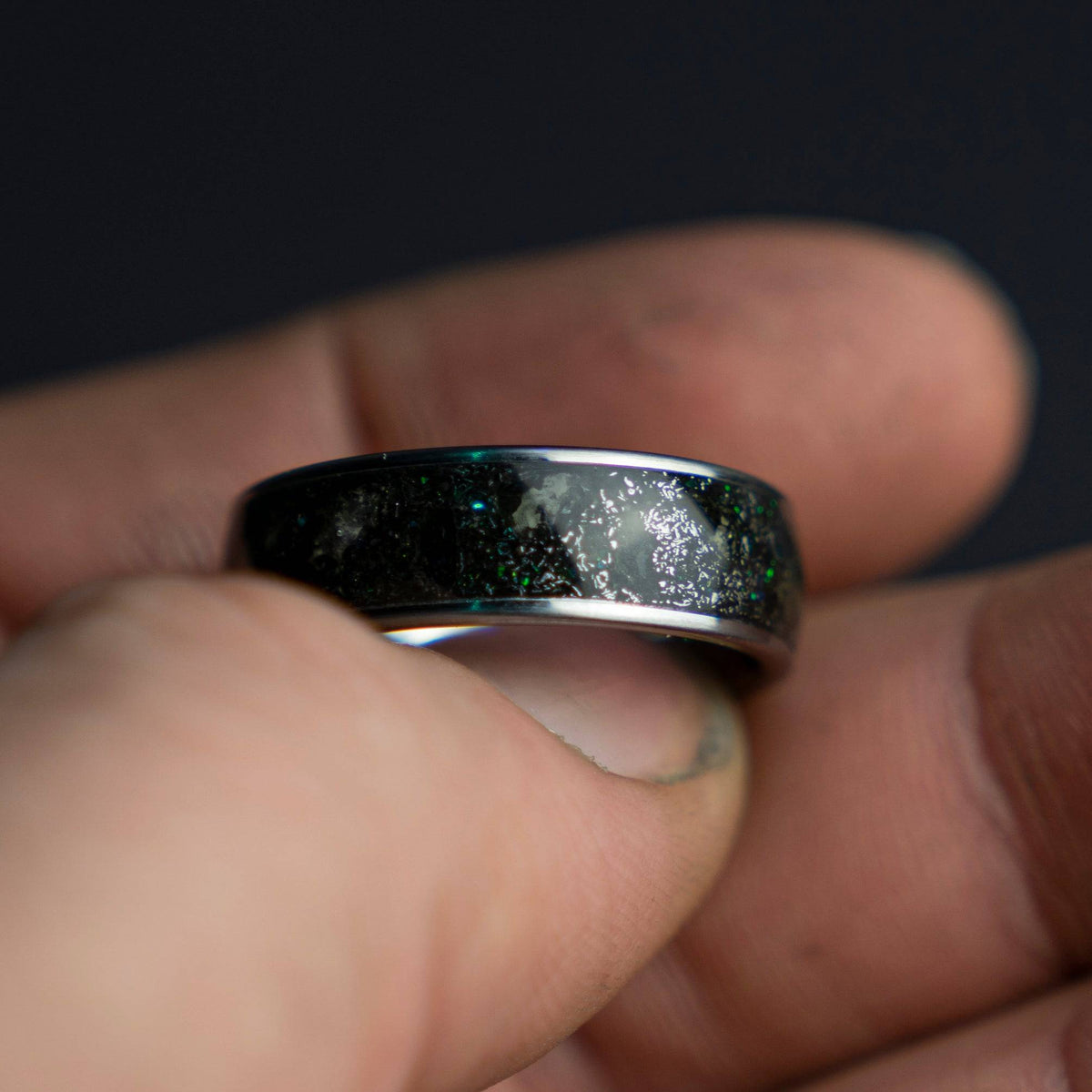 Tungsten ring filled with genuine Moldavite