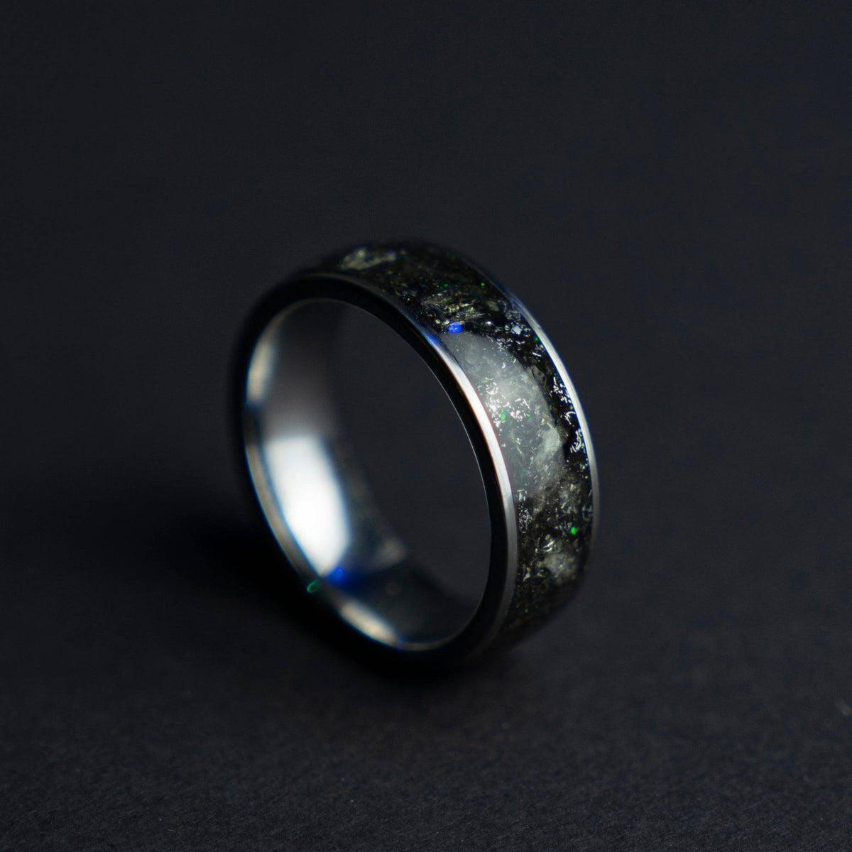Tungsten ring filled with genuine Moldavite