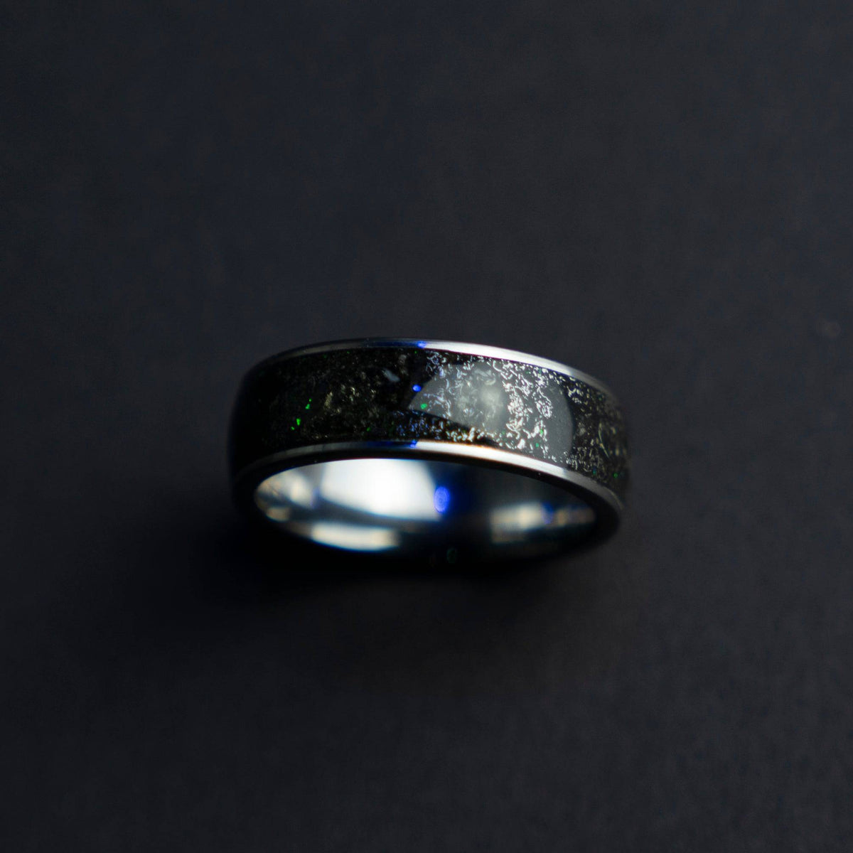Tungsten ring filled with genuine Moldavite