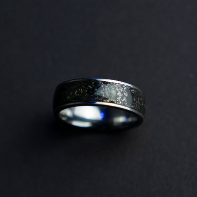 Tungsten ring filled with genuine Moldavite