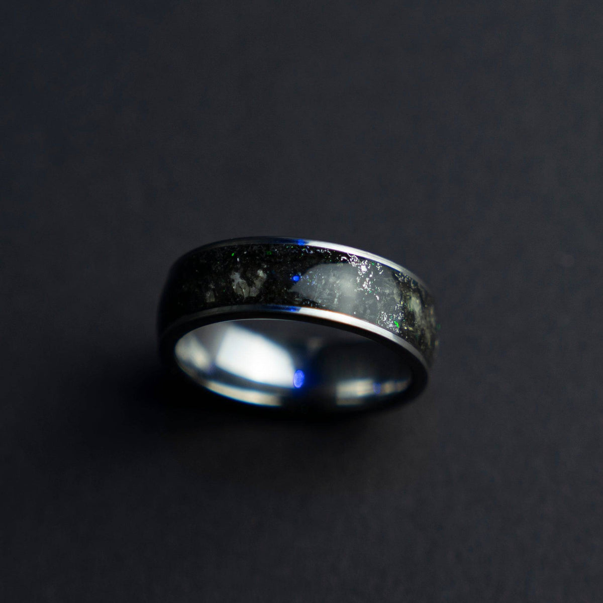 Tungsten ring filled with genuine Moldavite