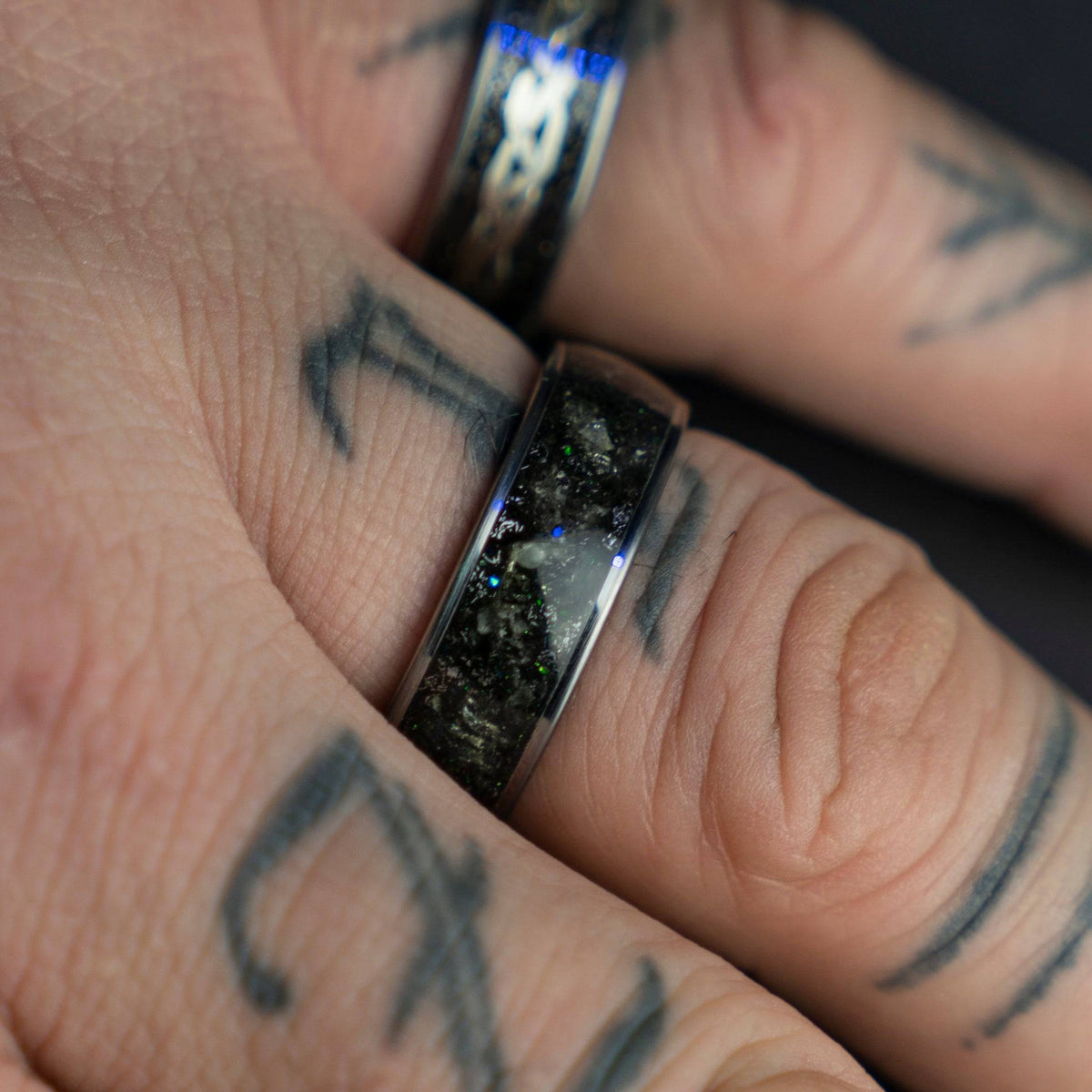 Tungsten ring filled with genuine Moldavite