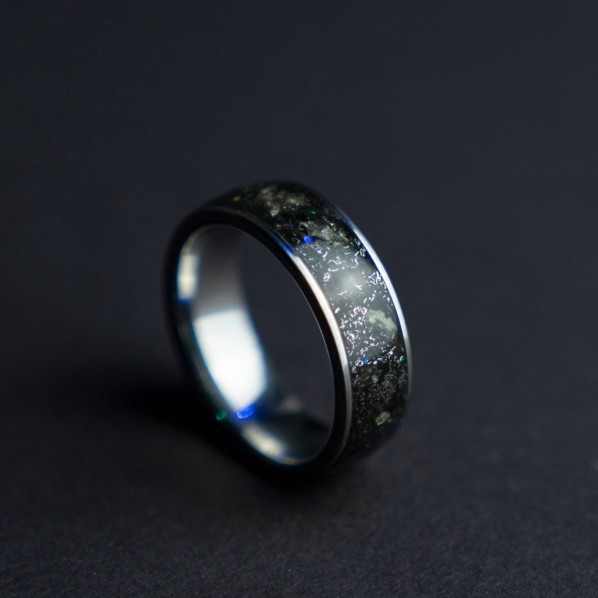 Tungsten ring filled with genuine Moldavite