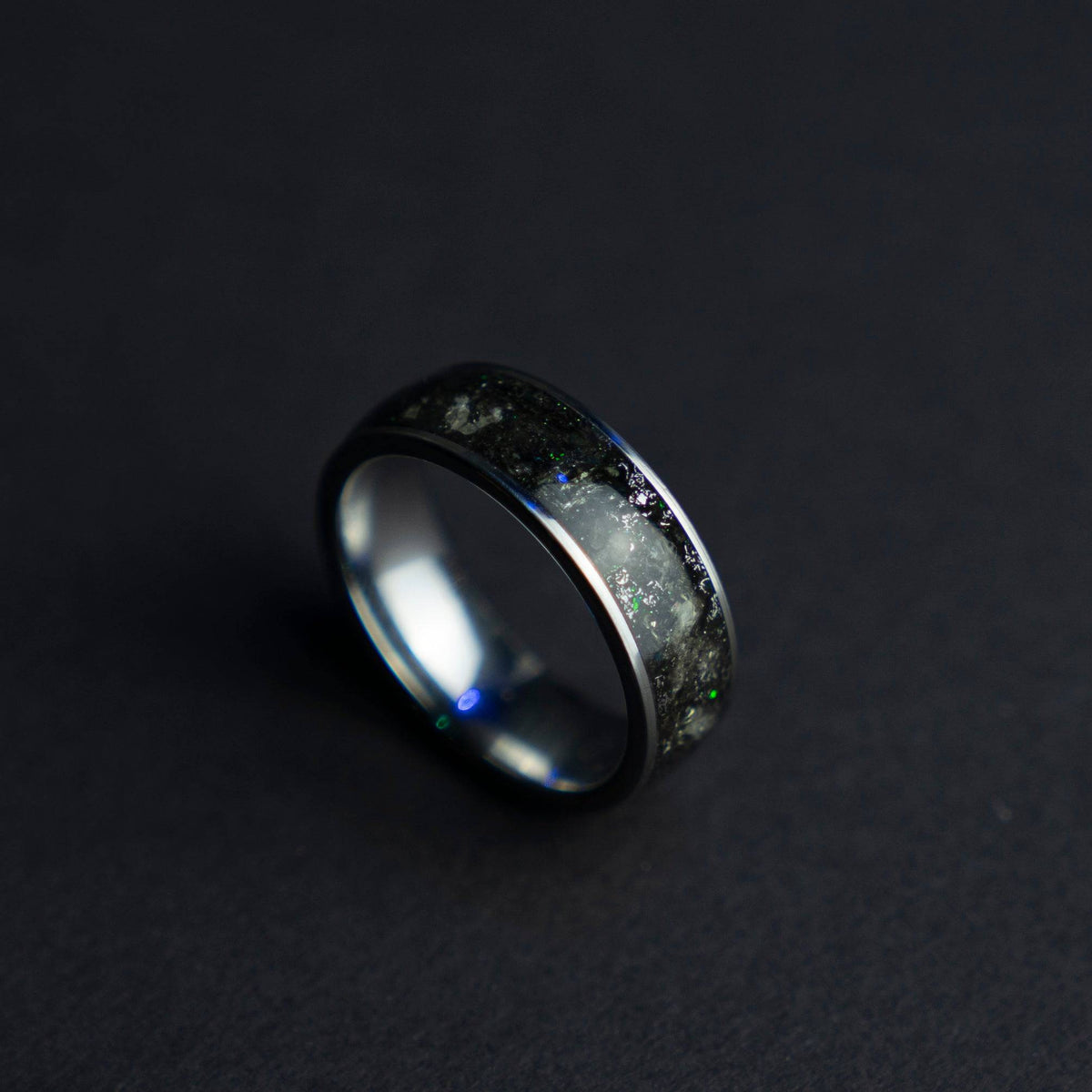 Tungsten ring filled with genuine Moldavite