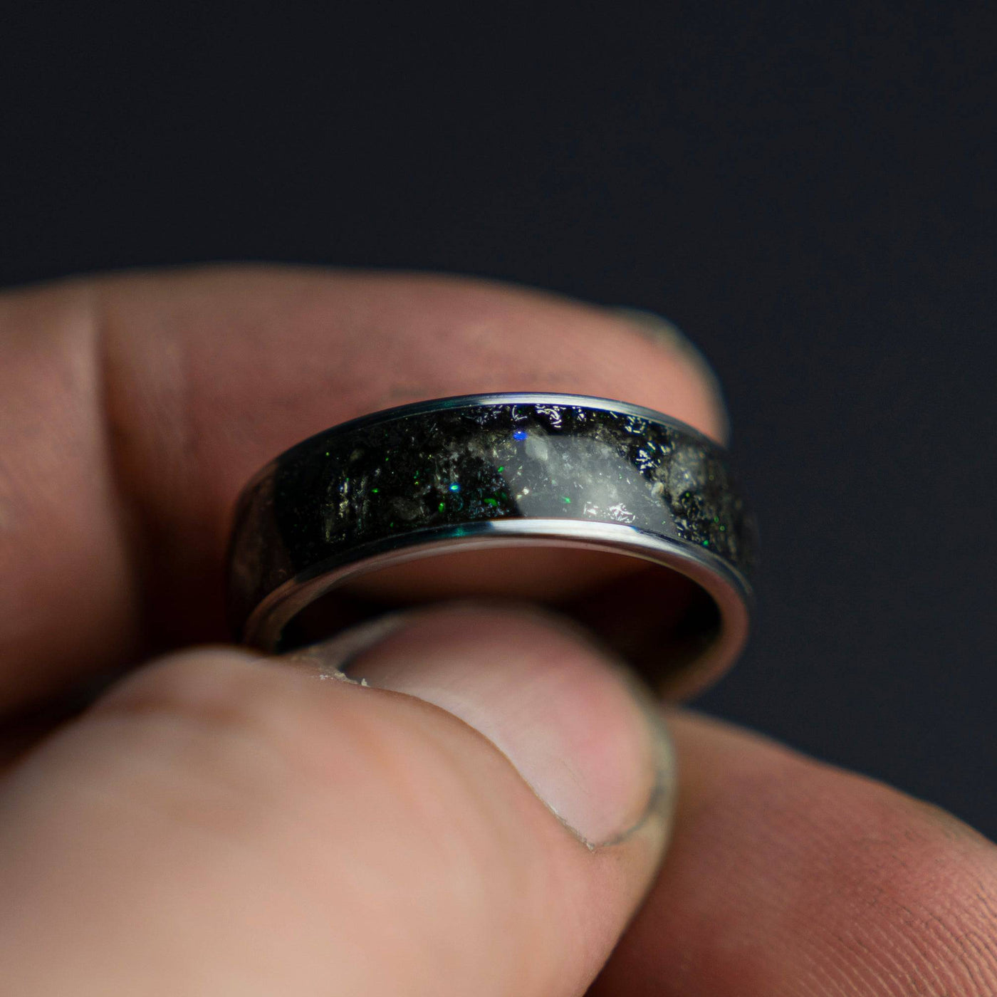Tungsten ring filled with genuine Moldavite