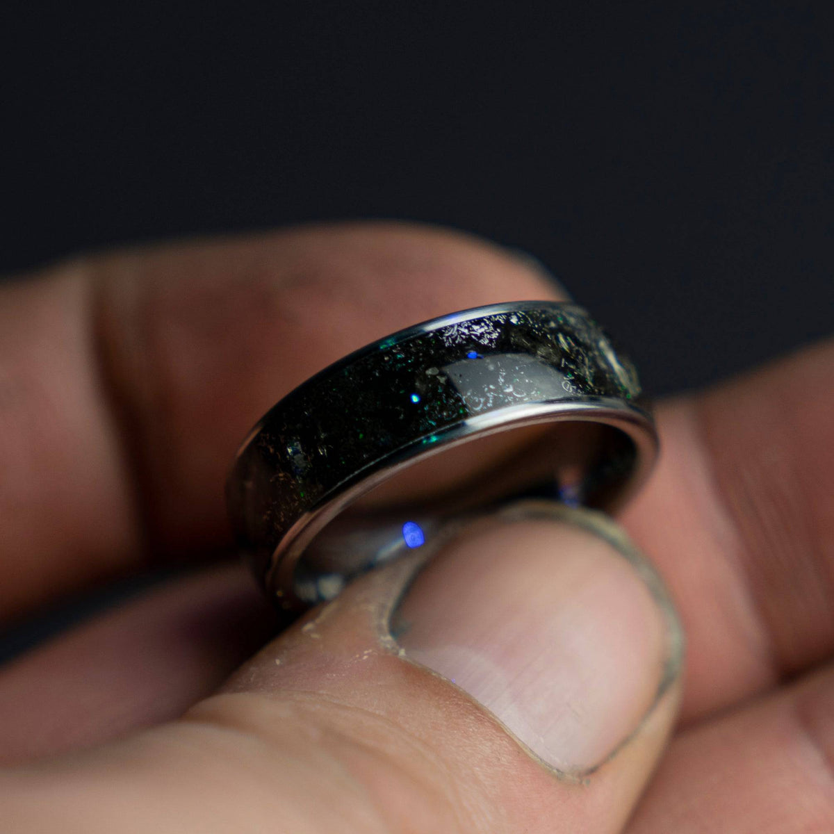 Tungsten ring filled with genuine Moldavite