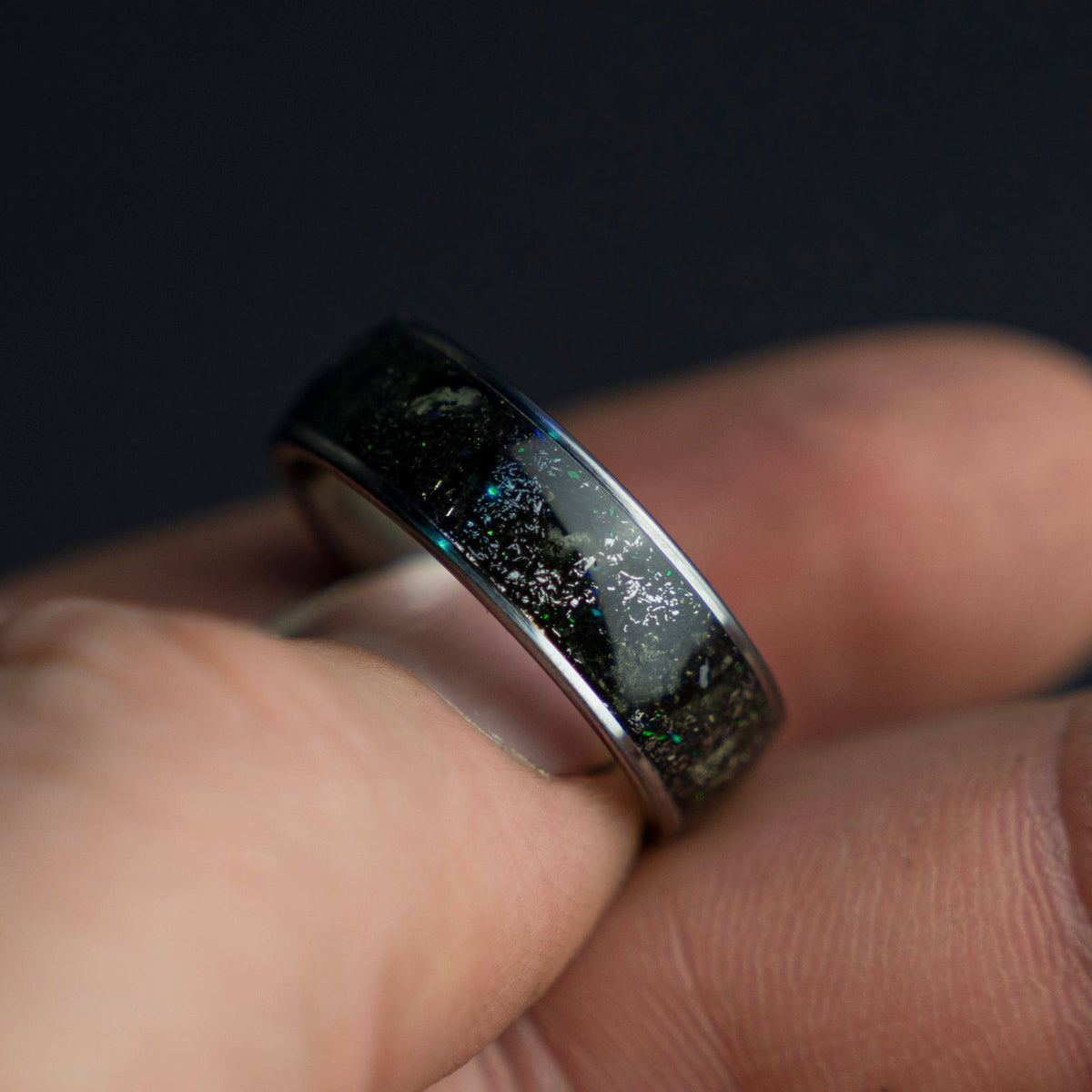 Tungsten ring filled with genuine Moldavite