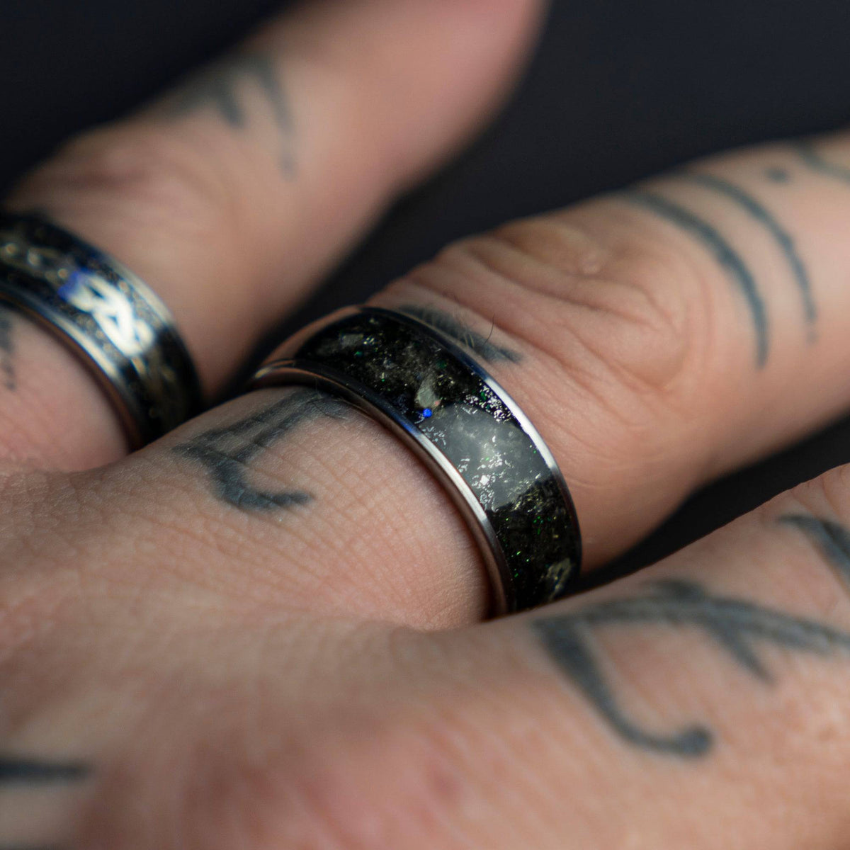 Tungsten ring filled with genuine Moldavite