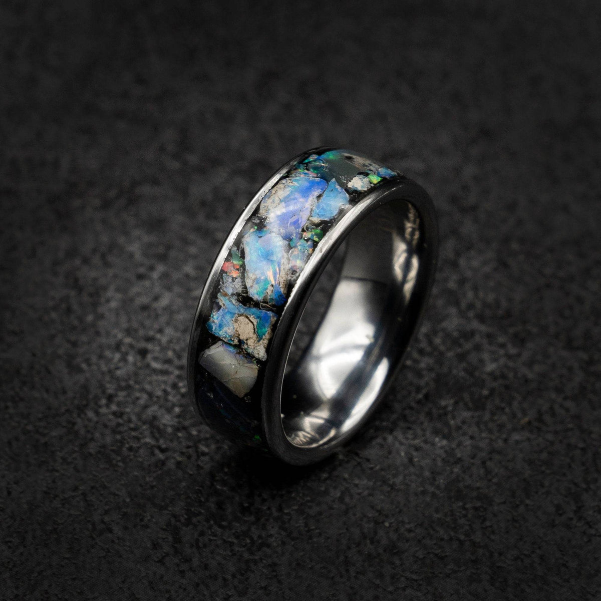 Tungsten ring filled with genuinge Australian black opal