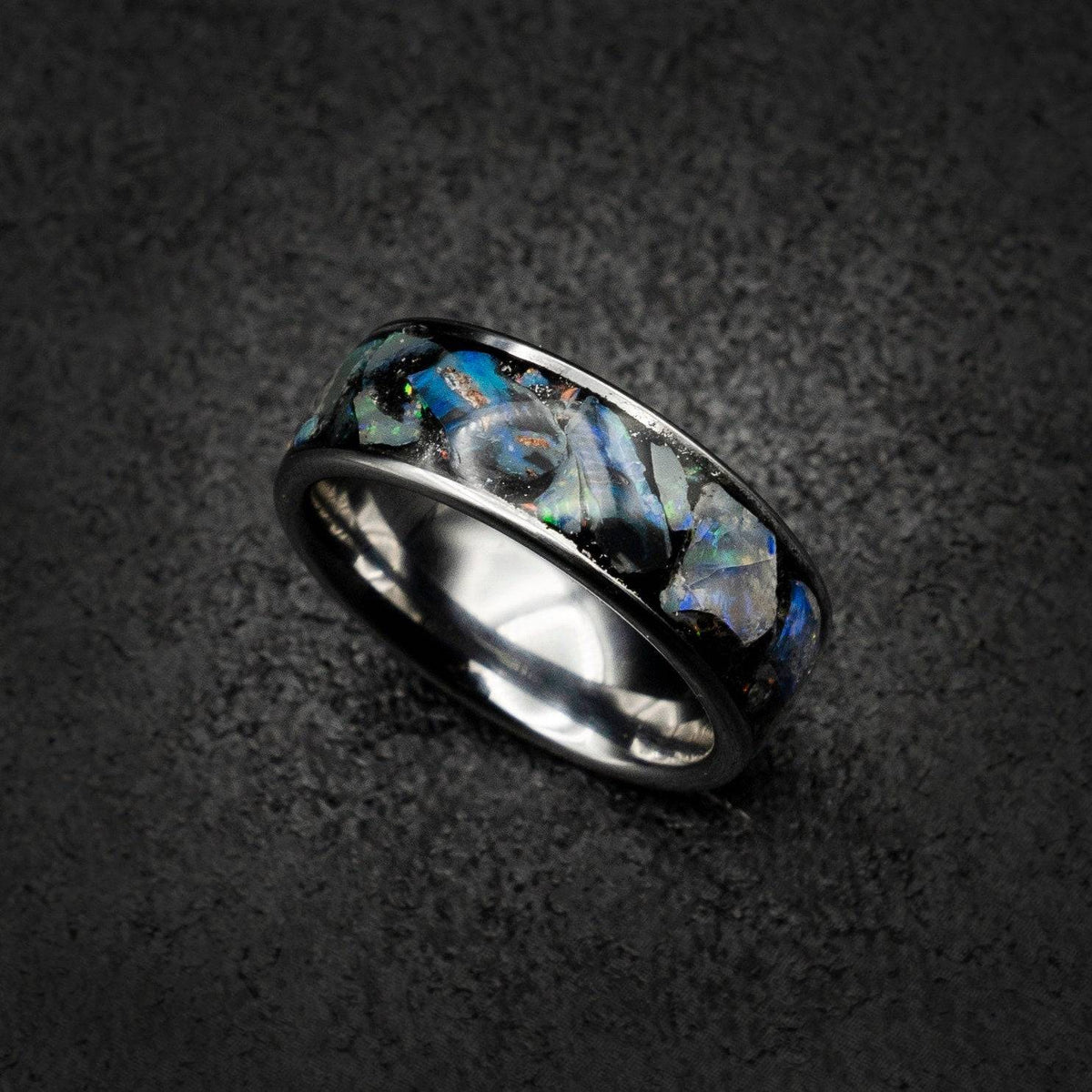 Tungsten ring filled with genuinge Australian black opal