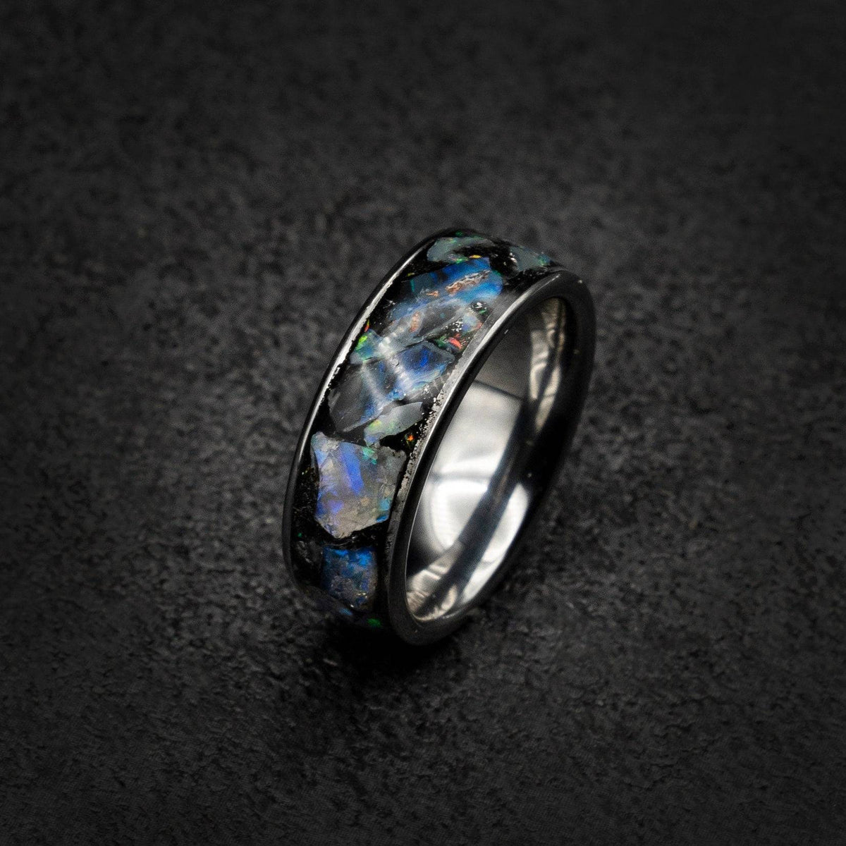 Tungsten ring filled with genuinge Australian black opal