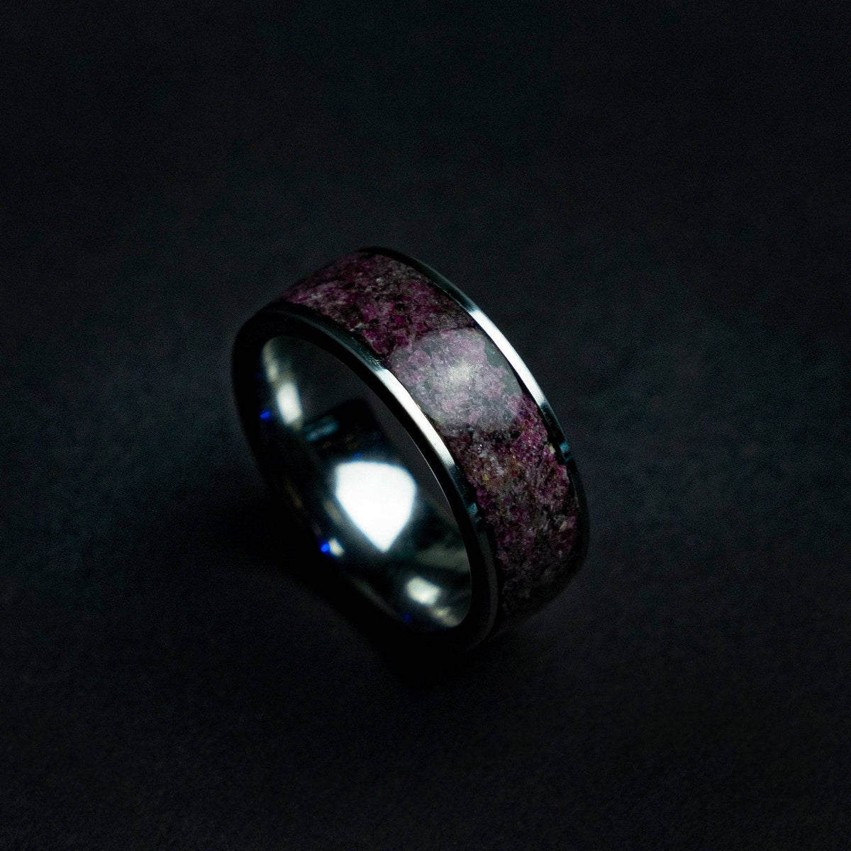 Tungsten ring filled with Ruby