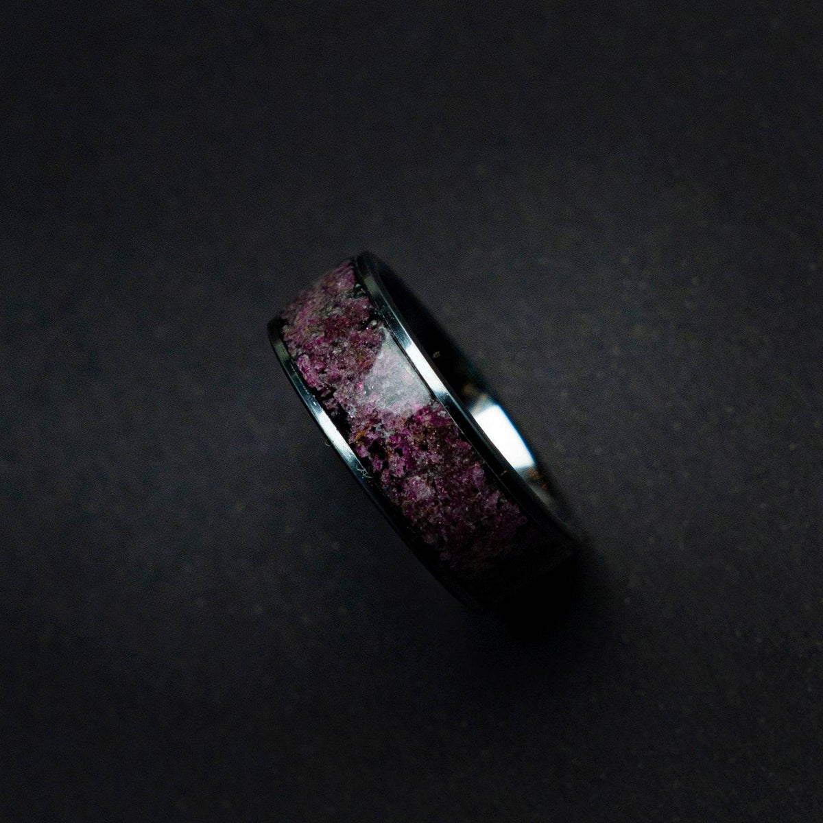 Tungsten ring filled with Ruby