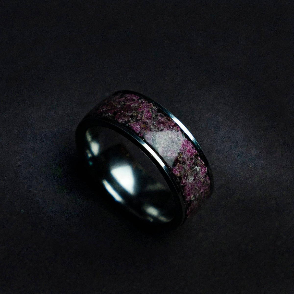 Tungsten ring filled with Ruby