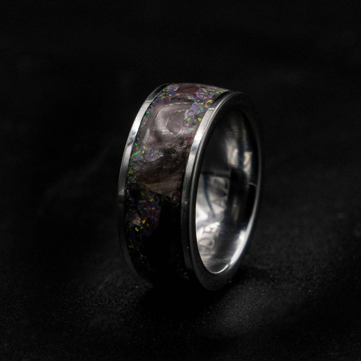 Tungsten ring filled with super seven gemstone
