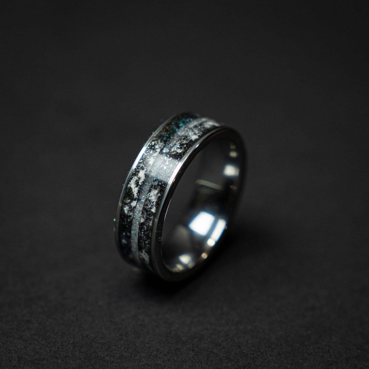 Tungsten ring with a line of Herkimer diamond, meteorite and glow