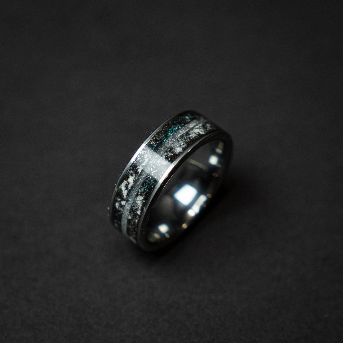 Tungsten ring with a line of Herkimer diamond, meteorite and glow