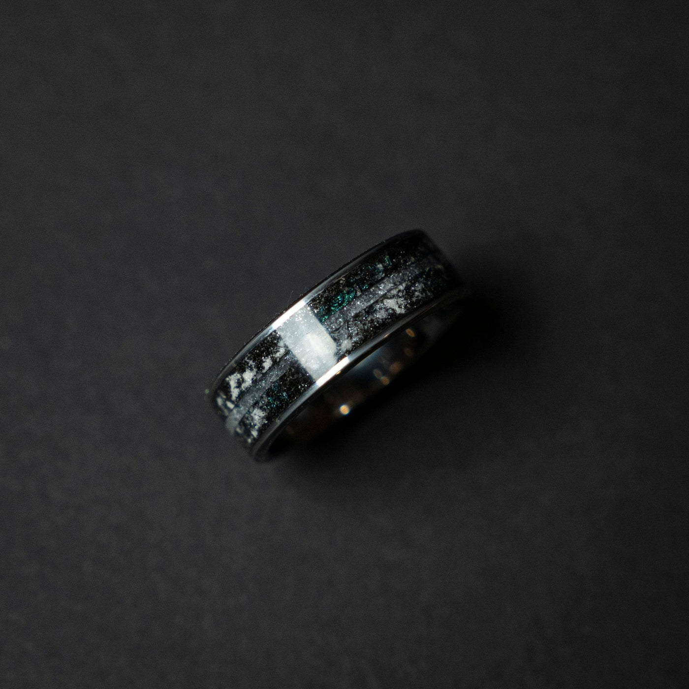 Tungsten ring with a line of Herkimer diamond, meteorite and glow